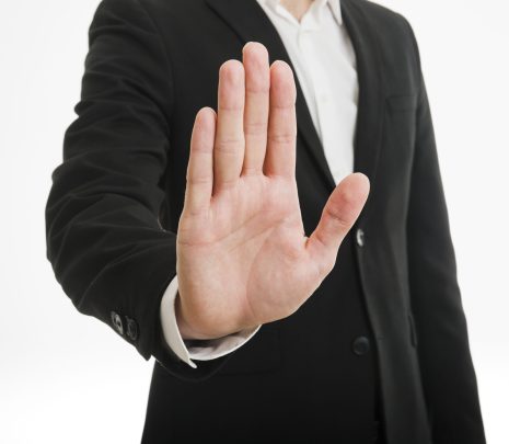 businessman-showing-palm-hand